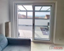 Wintergarten Lichtdurchflutetes Wohnen: KfW-55-Apartment mit Wintergarten, Aufzug und Doppelcarport!