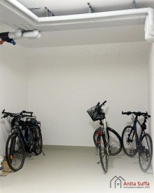 Fahrradkeller Lichtdurchflutetes Wohnen: KfW-55-Apartment mit Wintergarten, Aufzug und Doppelcarport!