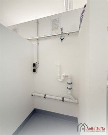 Waschmaschinenplatz Lichtdurchflutetes Wohnen: KfW-55-Apartment mit Wintergarten, Aufzug und Doppelcarport!