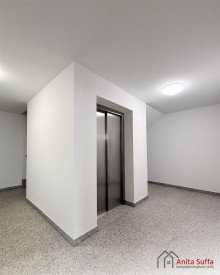 Aufzug Lichtdurchflutetes Wohnen: KfW-55-Apartment mit Wintergarten, Aufzug und Doppelcarport!